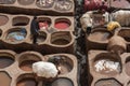 FEZ, MOROCCO Ã¢â¬â FEBRUARY 20, 2017 : Men working at the famous Chouara Tannery in the medina of Fez, Morocco Royalty Free Stock Photo